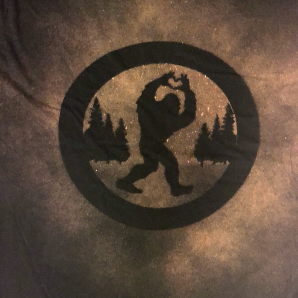 Handmade bleach painted Bigfoot making ❤️gesture with footprint on back side